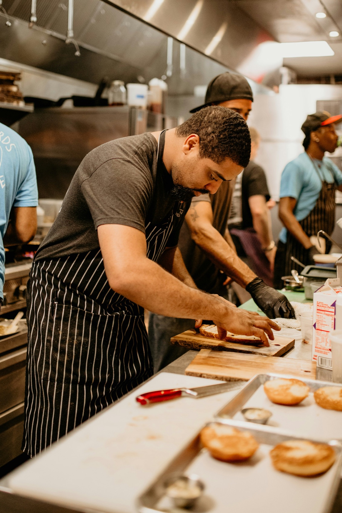 A chef preparing food during service